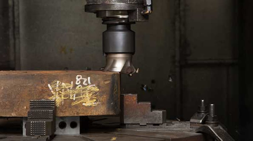 A 4-in. Ingersoll Hi-QuadXXX facemill takes off more than 0.300 in. per pass to fully penetrate the heavy oxide crust in a 4140 steel forging.