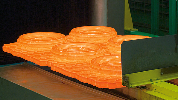 Isothermal forging is a closed-die process in which the dies and the workpieces are heated to the same temperature so that forming can take place without loss of temperature.