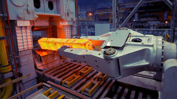 The inline forge press at the Faircrest Steel Plant is an opendie forging operation in service of largebar rolling chosen to improve the center soundness of SBQ steel It delivers 6000 psi of force to compress heated ingots and soon concast blooms prior to rolling Timken explained the opendie press improves the center soundness of its SBQ products