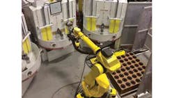 The threemachine gritblasting cell incorporates a Fanuc M710iC machinetending robot with RXS400 automated blast systems for unmanned descaling of forged automotive components The threemachine gritblasting cell incorporates a Fanuc M710iC machinetending robot with RXS400 automated blast systems for unmanned descaling of forged automotive components