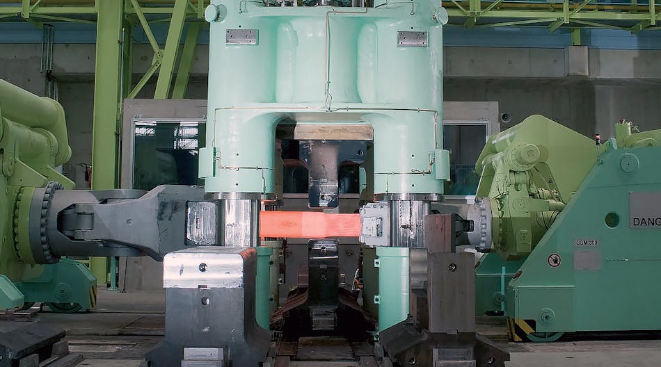 A 50-MN, hydraulic open-die press of comparable design, shown in operation.