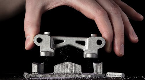 Desktop Metal calls its additive manufacturing technology &apos;microwave enhanced sintering.&apos; Metal and ceramic powders are mixed into a polymer, that is the medium for forming parts. Once a mixed-media item is printed, the parts are heat-treated to fuse the alloy structure, as the polymer content is vaporized. Charcoal filters will process exhaust fumes.