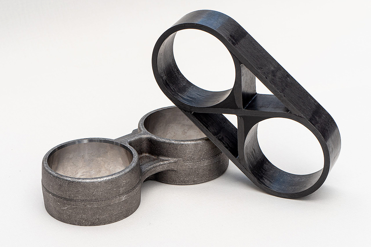 Alternative automotive brackets, produced in metal (left) and CFRP (right) using the 9T Labs Additive Fusion Technology.