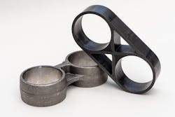 Alternative automotive brackets, produced in metal (left) and CFRP (right) using the 9T Labs Additive Fusion Technology. Alternative automotive brackets, produced in metal (left) and CFRP (right) using the 9T Labs Additive Fusion Technology.