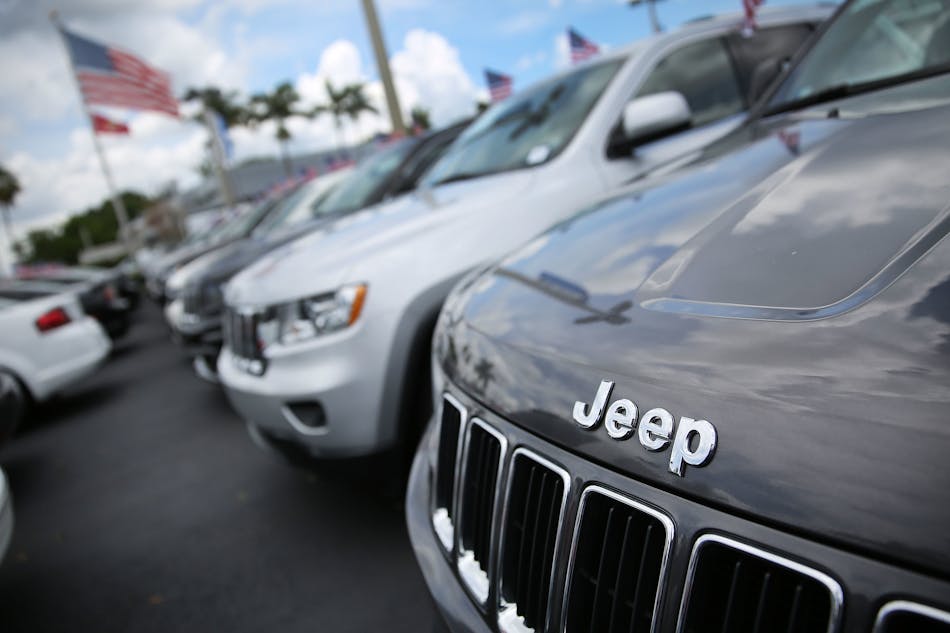 A Fiat Chrysler Jeep Grand Cherokee is seen on a sales lot as the company announced it is recalling about 1.4 million Dodges, Jeeps, Rams, and Chrysler vehicles equipped with certain radios on July 24, 2015, in Miami, Florida. The recall was announced after hackers were able to manipulate remotely a Jeep Cherokee&apos;s computer software.