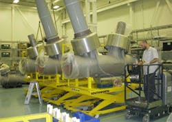 Elevated worker platforms raise the worker to the right height on large workpieces. Elevated worker platforms raise the worker to the right height on large workpieces.