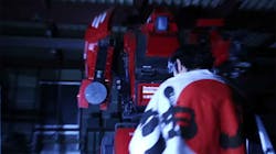 Kogoru Kurata stands before his high-tech mech, Kuratas. Kogoru Kurata stands before his high-tech mech, Kuratas.