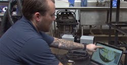 An API metrologist analyzing a scan of the raised Civil War battleship USS Monitor. An API metrologist analyzing a scan of the raised Civil War battleship USS Monitor.