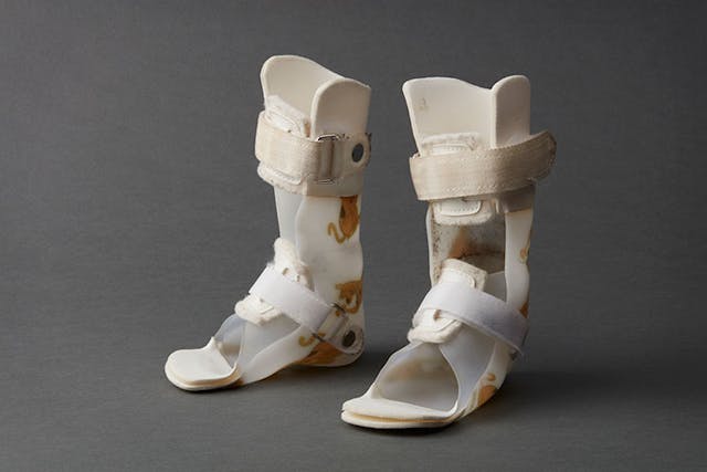 Traditional pair of pediatric ankle foot orthoses.