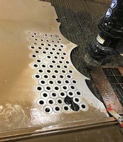 Www Newequipment Com Sites Newequipment com Files Link 1218 Omax Tropical J Cutting Grommets2 400 Www Newequipment Com Sites Newequipment com Files Link 1218 Omax Tropical J Cutting Grommets2 400