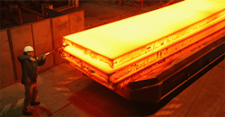 Worker with molten metal Worker with molten metal