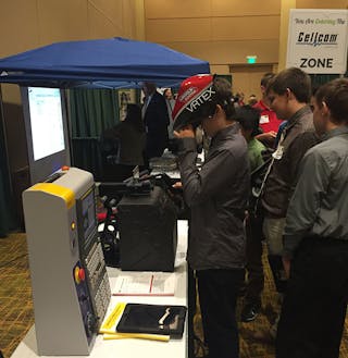 A STEM student tests out a Lincoln Electric VRTEX Virtual Welding Trainer at jobs fair.
