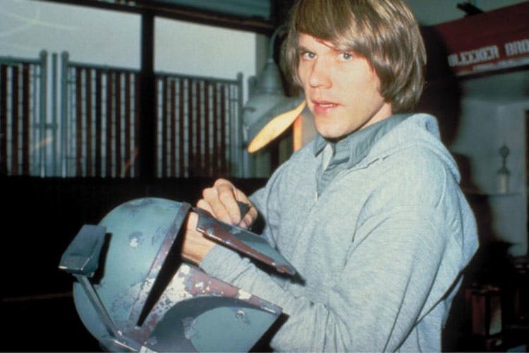RealWear&apos;s industrial designer Stephen Pombo assisted Joe Johnston (above) in designing the iconic Boba Fett helmet, which appears to have its own monocular display.