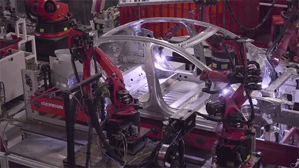Robots Assembling Tesla Car