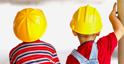 Children wearing hard hats Children wearing hard hats