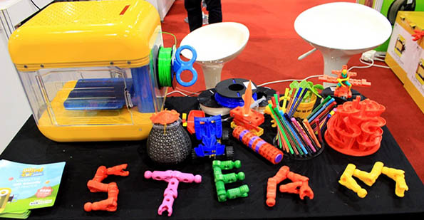 Toys spell the word STEAM