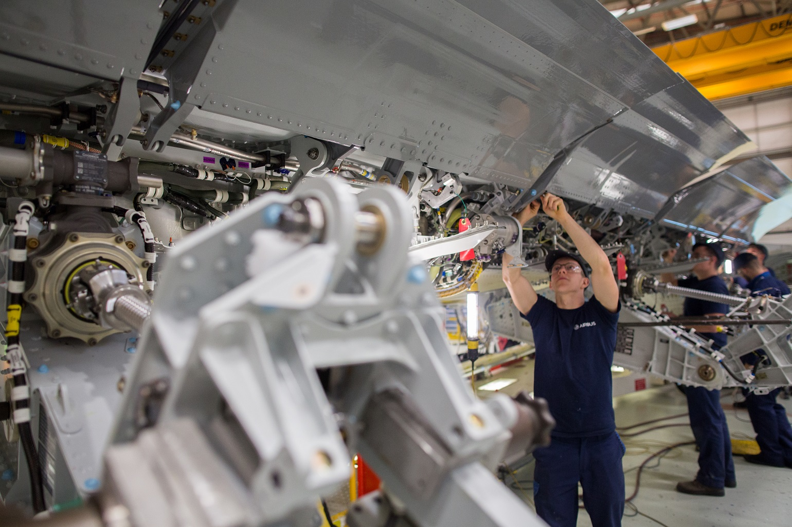 Workers-Maintaining-Airplane