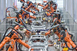 Kuka Systems robots assembling cars in Audi plant Kuka Systems robots assembling cars in Audi plant