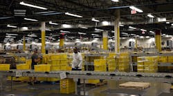 Newequipment 71 Plant Operations Workers Packing Yellow Bins In Factory Newequipment 71 Plant Operations Workers Packing Yellow Bins In Factory