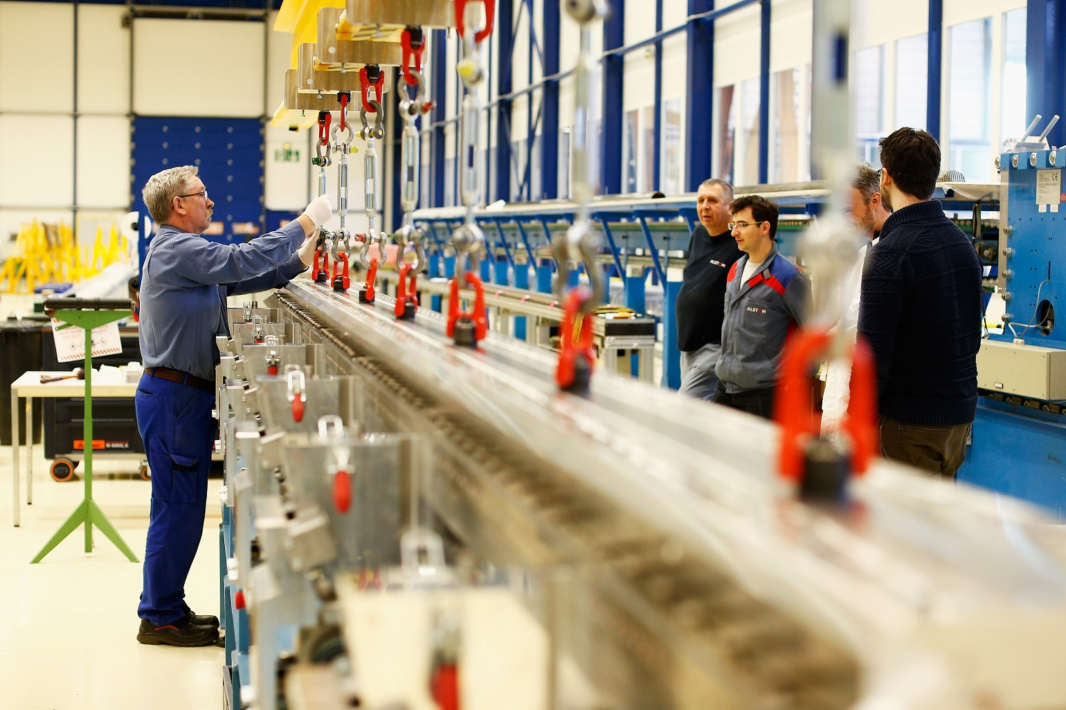 Worker-Hooking-Up-Two-Parts