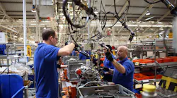Workers-Assembling-Engine