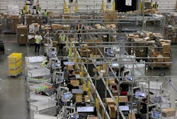 Workers-Packing-Boxes-In-Factories Workers-Packing-Boxes-In-Factories