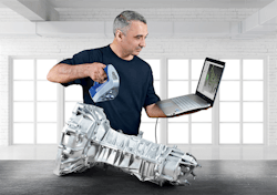 Man using Artec Spider to scan gearbox Man using Artec Spider to scan gearbox