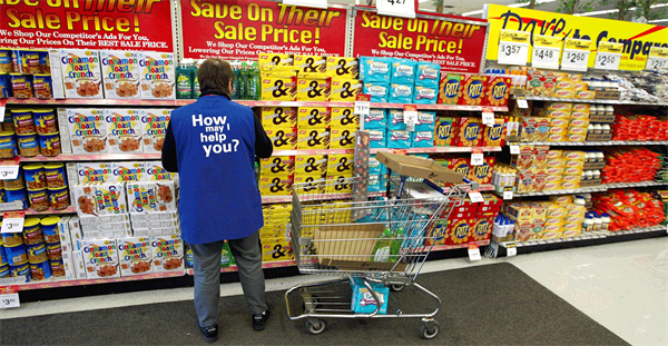 Walmart worker stocking shelves