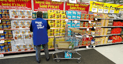 Walmart worker stocking shelves Walmart worker stocking shelves