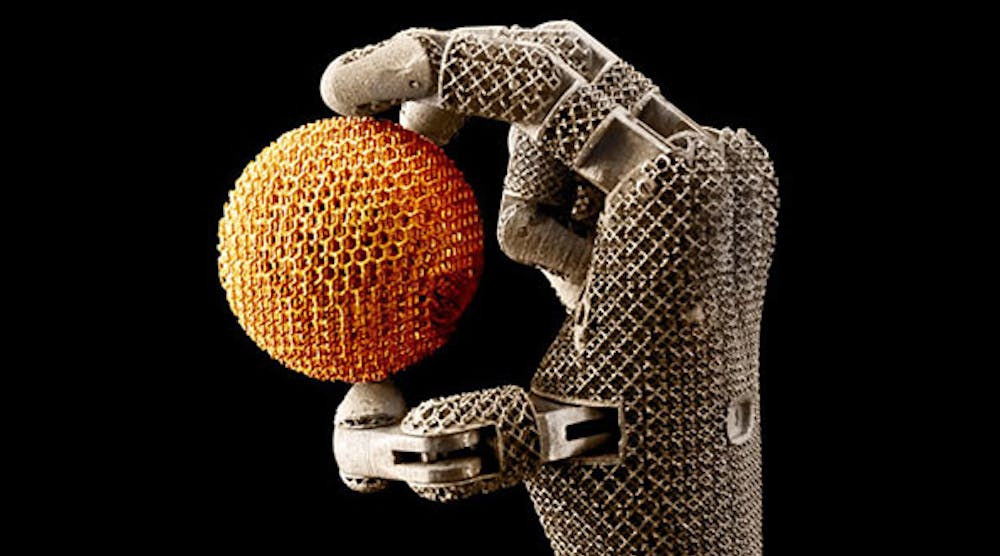 Metal mesh hand holding metal mesh ball