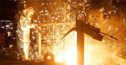 Worker in steel manufacturing plant Worker in steel manufacturing plant