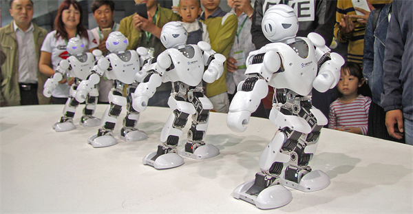 Four robots in synchronous motion