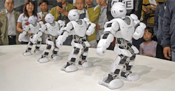 Four robots in synchronous motion Four robots in synchronous motion
