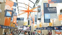 Crowd moving about convention hall Crowd moving about convention hall