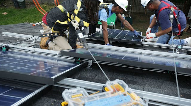 Newequipment 965 Men Install Solar Panels