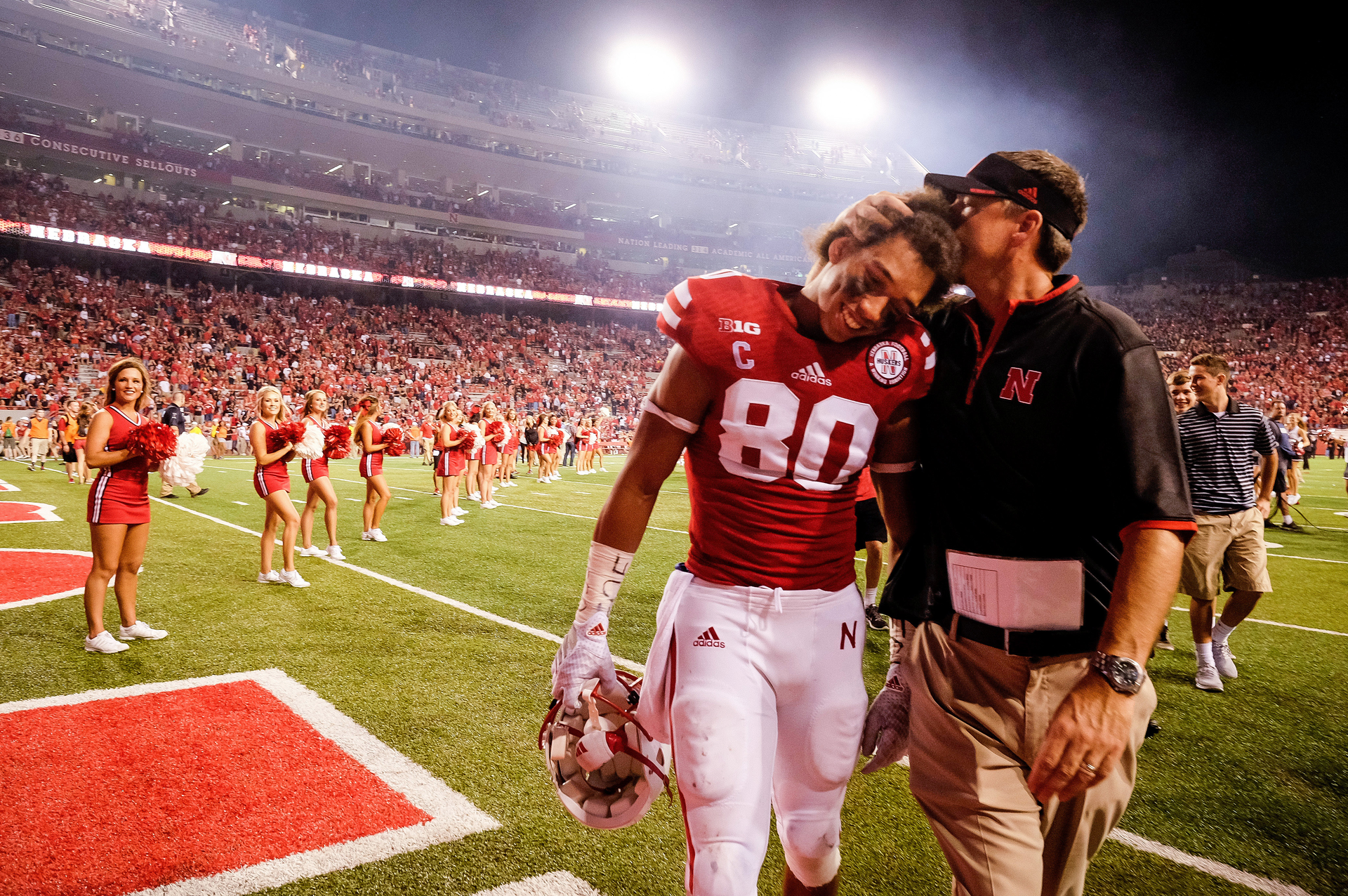 Football coach and player