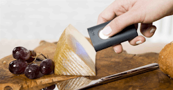 Scanning cheese on cutting board Scanning cheese on cutting board