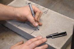 pen-cinderblock-revmark pen-cinderblock-revmark