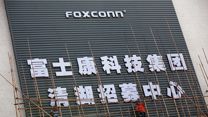 The Hon Hai / Foxconn wordmark on the exterior of a building.