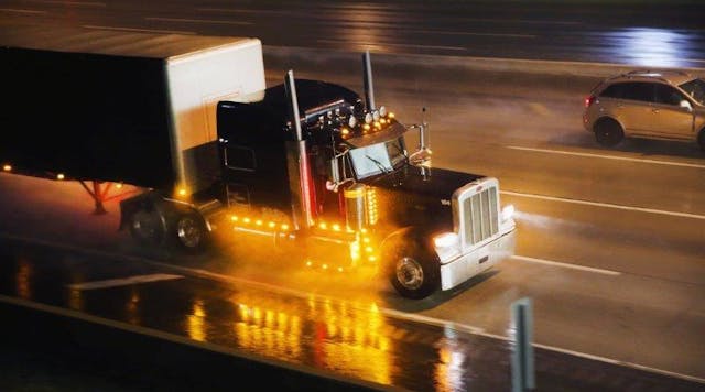 Newequipment 9523 Link Truck On Highway At Night