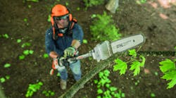 The battery-powered STIHL KMA 130 R KombiMotor with Pole Pruner attachment