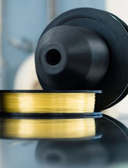 The spindle adapter holds spools of material in place. The spindle adapter holds spools of material in place.