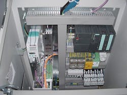 View of an electric cabinet with integrated PLC View of an electric cabinet with integrated PLC
