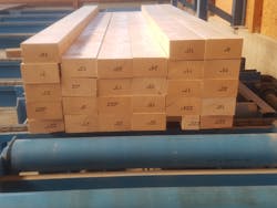 The result of the processing: stack of wooden beams cut by the system and automatically labeled. The result of the processing: stack of wooden beams cut by the system and automatically labeled.