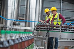Workers on Beverage Production Line Workers on Beverage Production Line