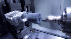 Flex-Hone automated setup for cross hole deburring. Flex-Hone automated setup for cross hole deburring.