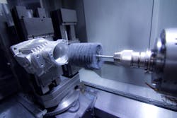 Flex-Hone automated setup for cross hole deburring. Flex-Hone automated setup for cross hole deburring.