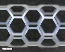 Polymer stent cut in a delicate honeycomb structure, made with ultrashort pulse laser cutting.