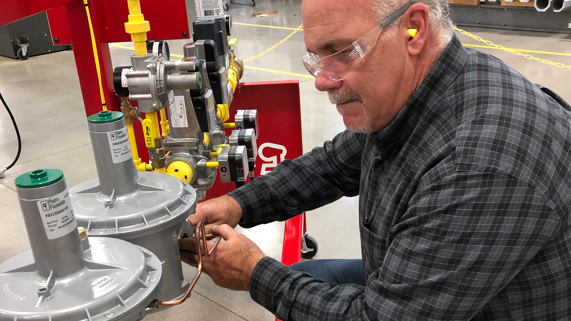 Worker checking valve train