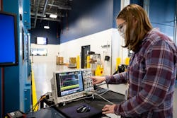 Mary Fedrick, Ford Motor Co. battery validation engineer, uses an Oscilloscope, a piece of equipment that captures quick events on a battery pack including the time it takes for the contactors to open or close, at Ford’s Battery Benchmarking and Test Laboratory in Allen Park, Michigan. This test confirms the battery is reacting at the correct speed when the vehicle is turned on or off. Mary Fedrick, Ford Motor Co. battery validation engineer, uses an Oscilloscope, a piece of equipment that captures quick events on a battery pack including the time it takes for the contactors to open or close, at Ford’s Battery Benchmarking and Test Laboratory in Allen Park, Michigan. This test confirms the battery is reacting at the correct speed when the vehicle is turned on or off.